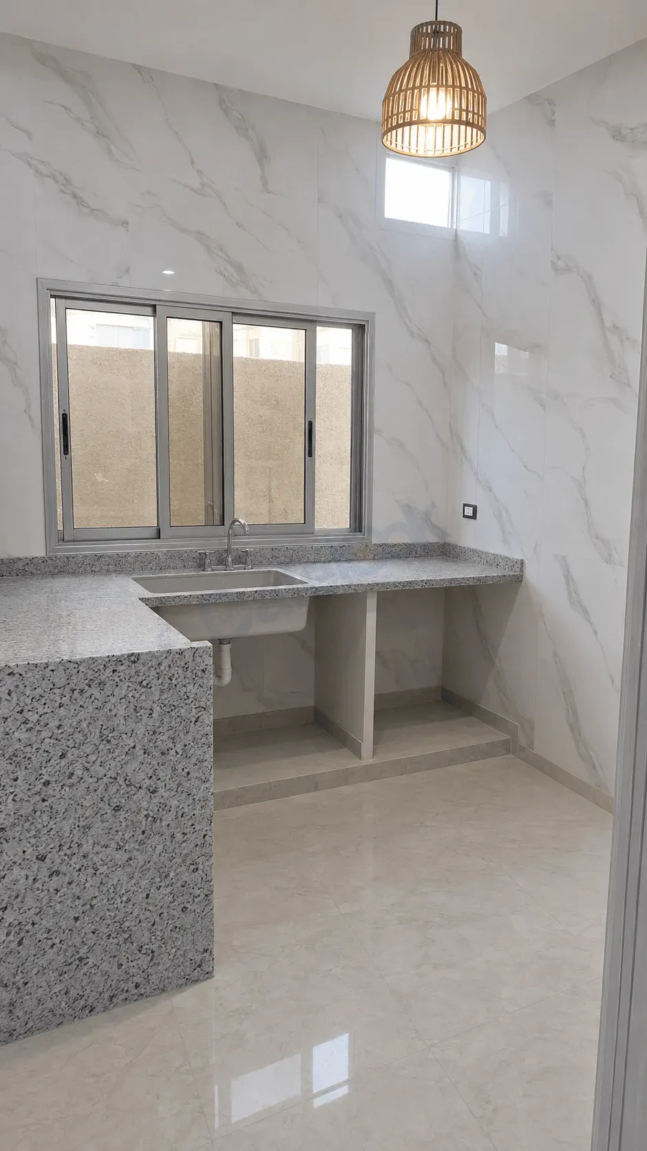 uploads/advertisements/images/شقة_للبيع_قريبة_من_دوار_ببيلا__2_-1783114052170.webp