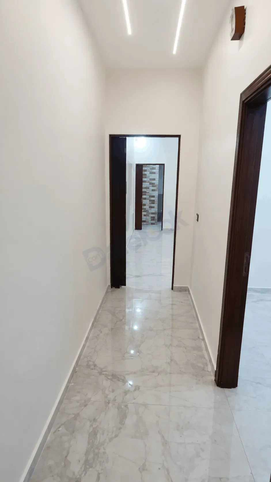 uploads/advertisements/images/شقة_للبيع_قريبة_من_دوار_ببيلا__7_-1783114052169.webp