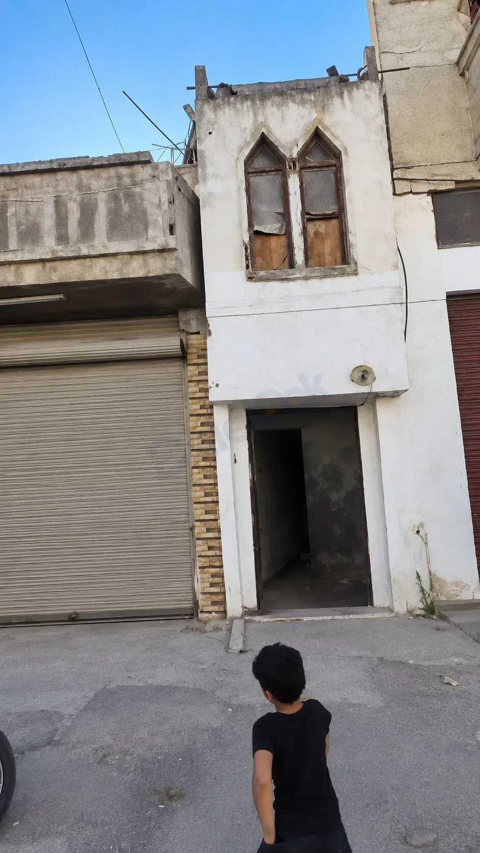 للبيع بناء كامل في حمص الزهراء شارع اسكندرون