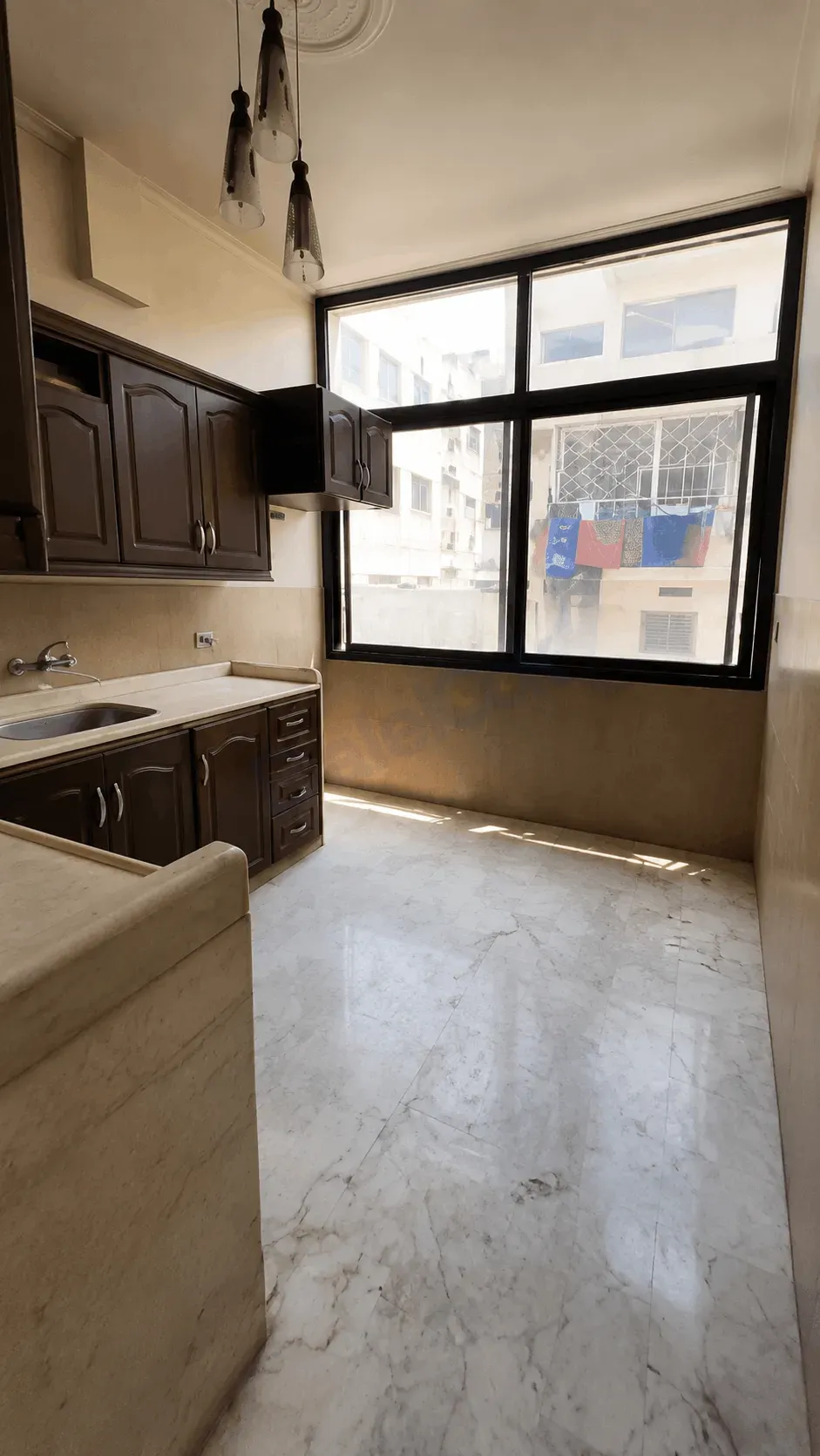 uploads/advertisements/images/للبيع_شقة_غرفتين_وصالة_في_عين_ترما__2_-1783889244957.webp