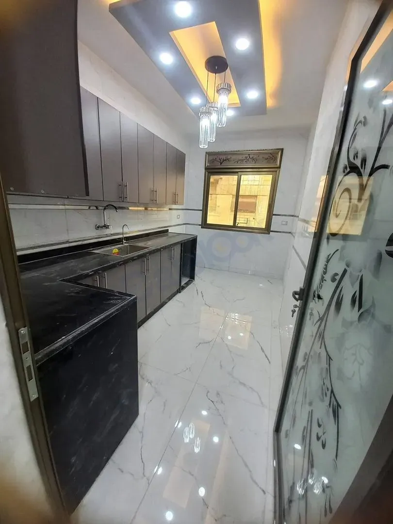 uploads/advertisements/images/للبيع_شقق_سكنية_قيد_التشطيب_في_تنظيم_البويقية__11_-1783364606592.webp