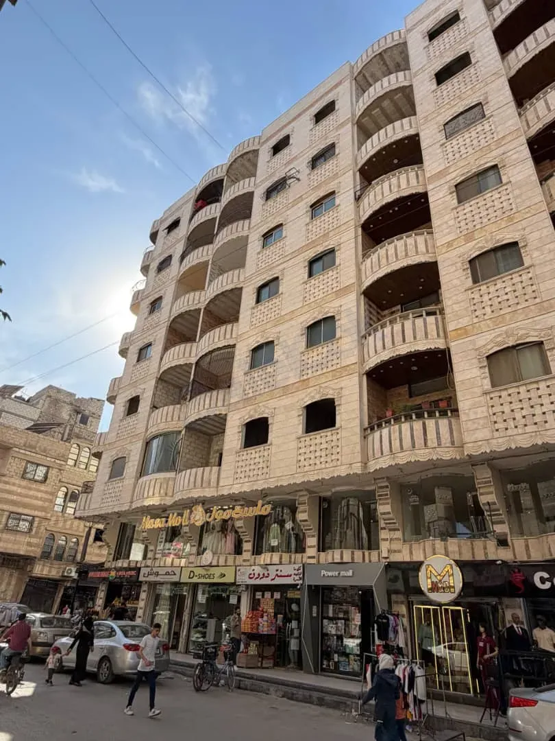 للبيع مجموعة شقق ببيلا بسوق الشراءي