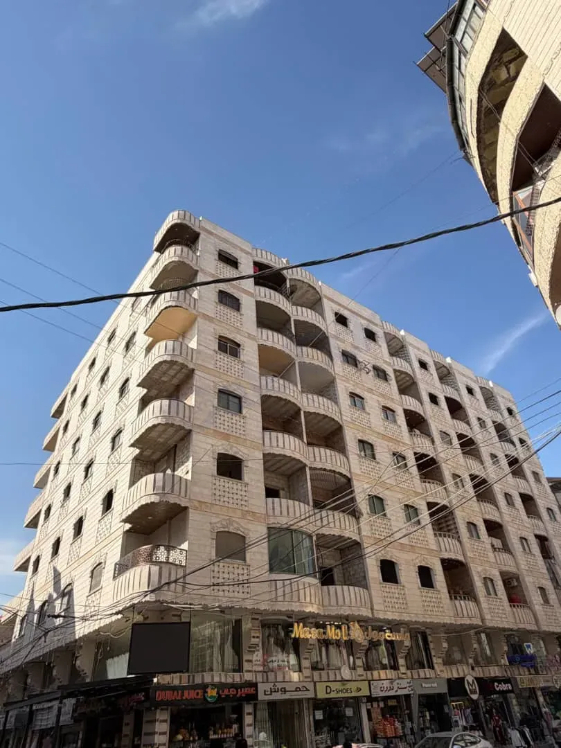 للبيع مجموعة شقق ببيلا بسوق الشراءي