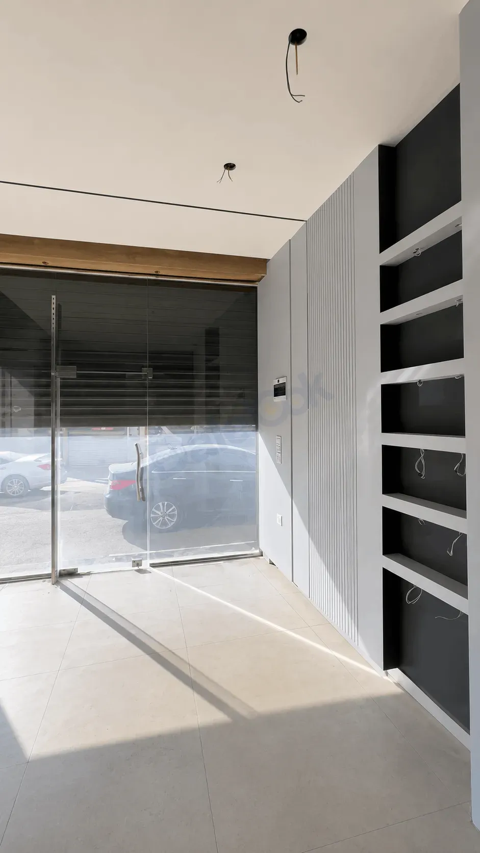 For sale a commercial store in Jdeidat Artouz Al Balad on the highway directly